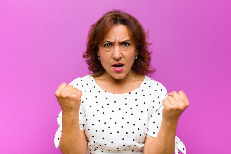 https://ru.freepik.com/premium-photo/middle-aged-woman-shouting-aggressively-with-annoyed-frustrated-angry-look-and-tight-fists-feeling-furious-over-purple-wall_7723447.htm