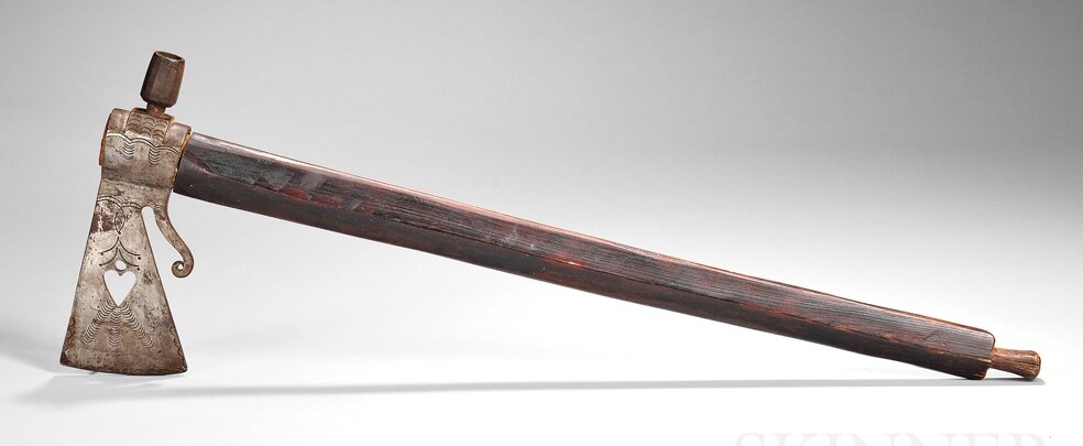 Great Lakes Pipe Tomahawk, c. late 19th century, the head with heart cutout and incised decoration, faceted bowl, and sword guard, the ash shaft file-branded and with dark patina, lg. 25 1/2 in.