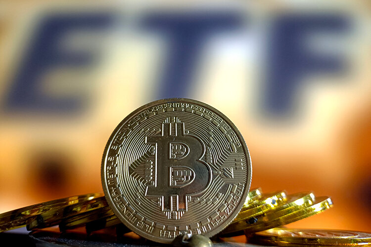    10 января комиссия по ценным бумагам и биржам (SEC) США после 10-летнего сопротивления все-таки разрешила торговать акциями фондов, инвестирующих в криптовалюту Фото: © Cfoto / Keystone Press Agency / www.globallookpress.com