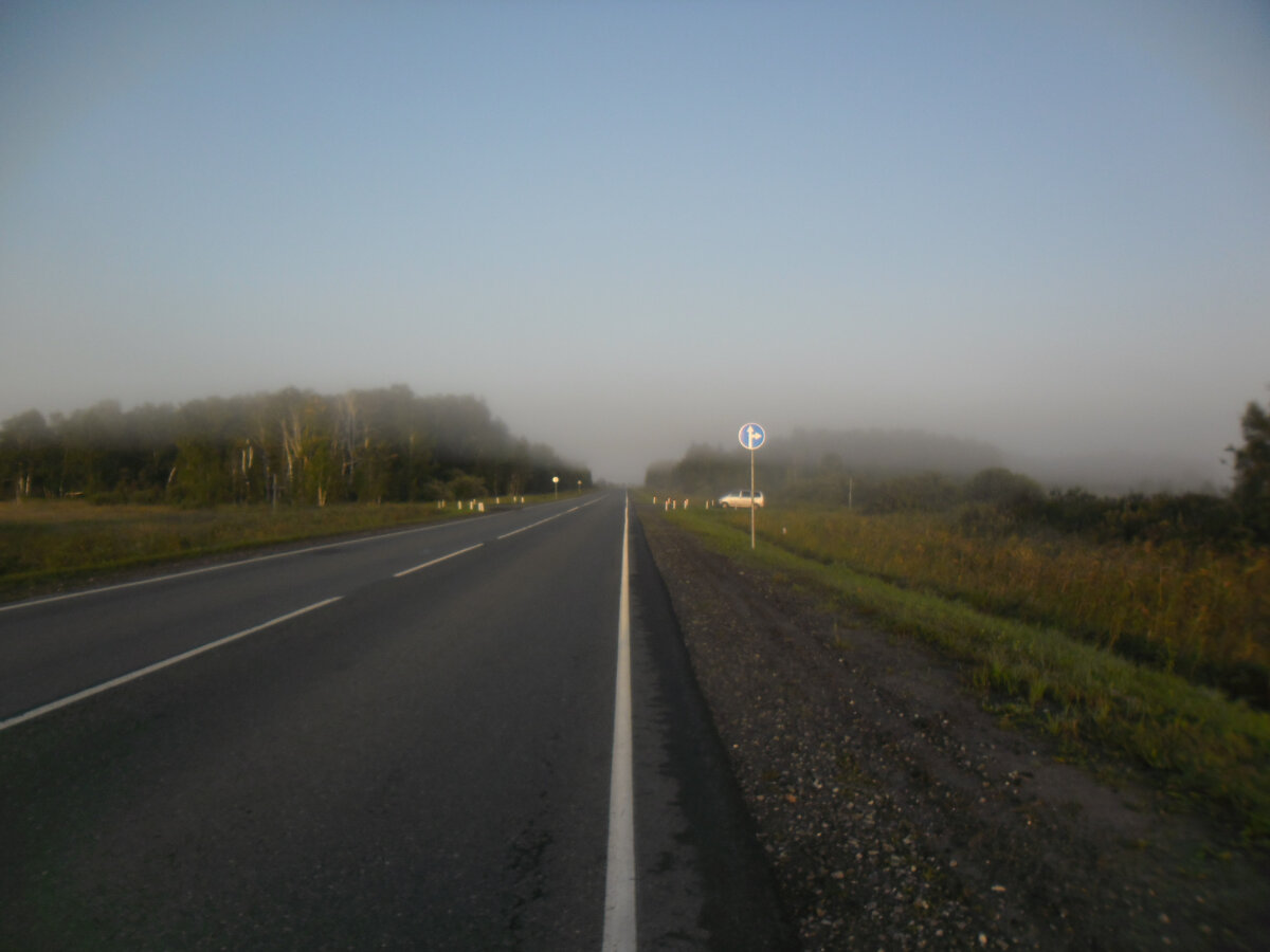 Вон где деревья начинаются то потом долго ехали и петляли среди черного не красивого совсем леса. Мало интересного. Это уже Курганская область.