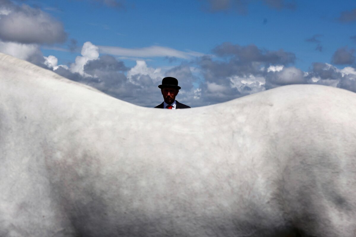 Judge Vincent Holian looks on during the yearling filly class at the Roundstone Connemara Pony Show, in the County Galway village of Roundstone, Ireland, July 9, 2023. REUTERS/Clodagh Kilcoyne  