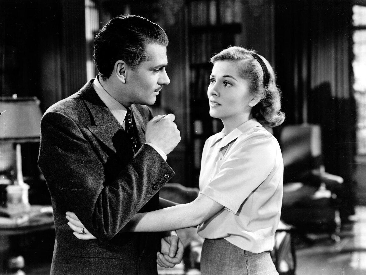 Актер Лоуренс Оливье и актриса Джоан Фонтейн в фильме Альфреда Хичкока «Ребекка» (Rebecca)