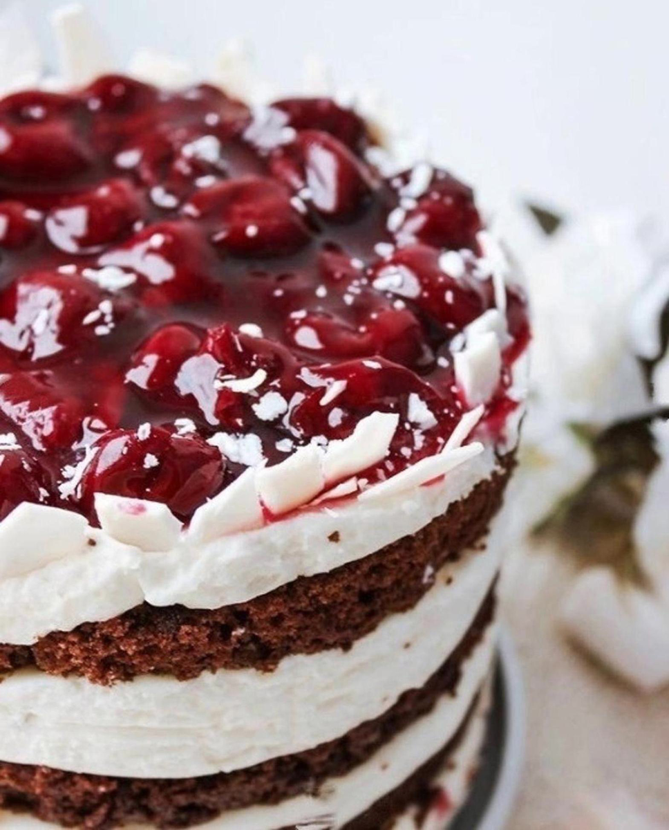 Tall Cake with Cherries on Top