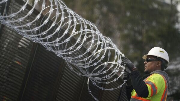    © AP Photo / John Minchillo