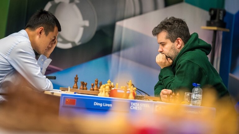    Дин Лижэнь и Ян Непомнящий.tatasteelchess.com