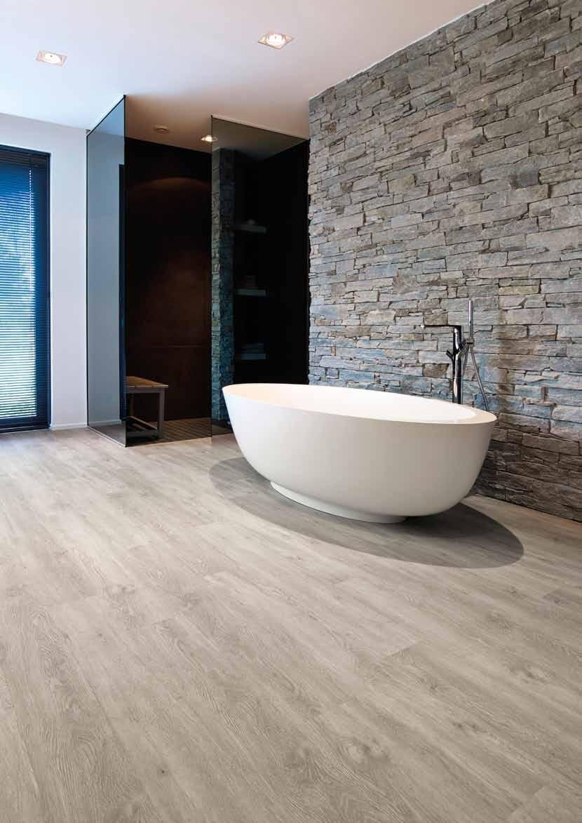 декоративный камень в интерьере гостиной. декоративный камень для внутренней отделки. декоративный кирпич в интерьере. декоративные панели в интерьере гостиной. современная отделка потолка.