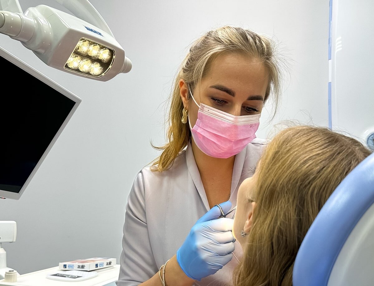 Осмотр у стоматолога