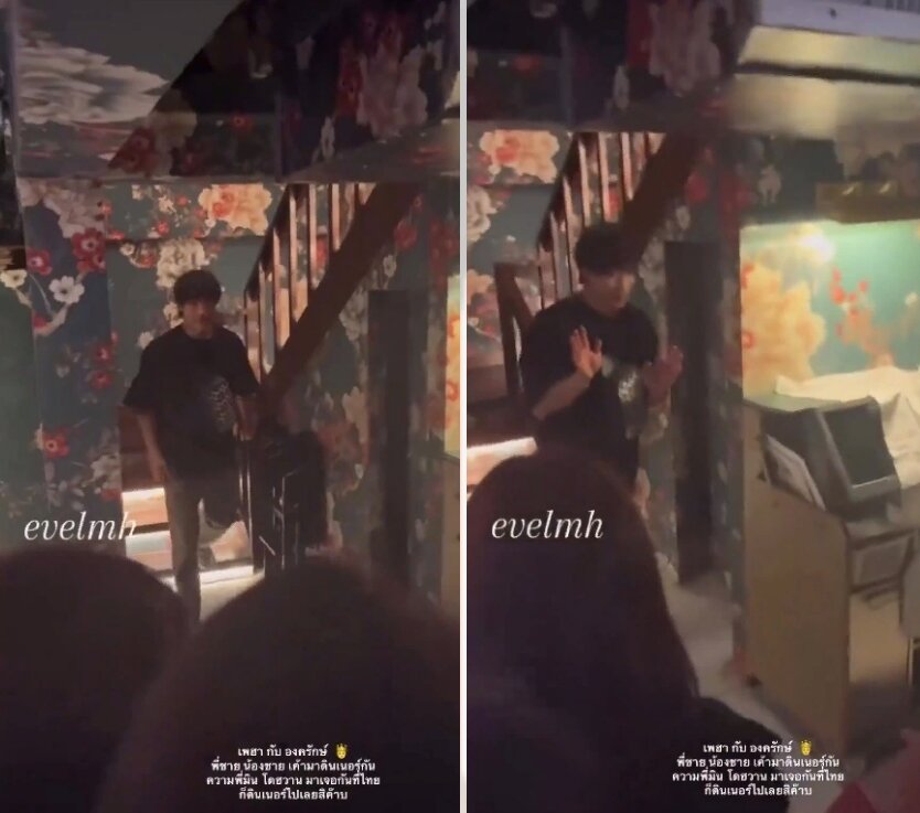 Во-он то красно-желтое пятнышко на синей майке за перилами над плечом ЛМХ! 