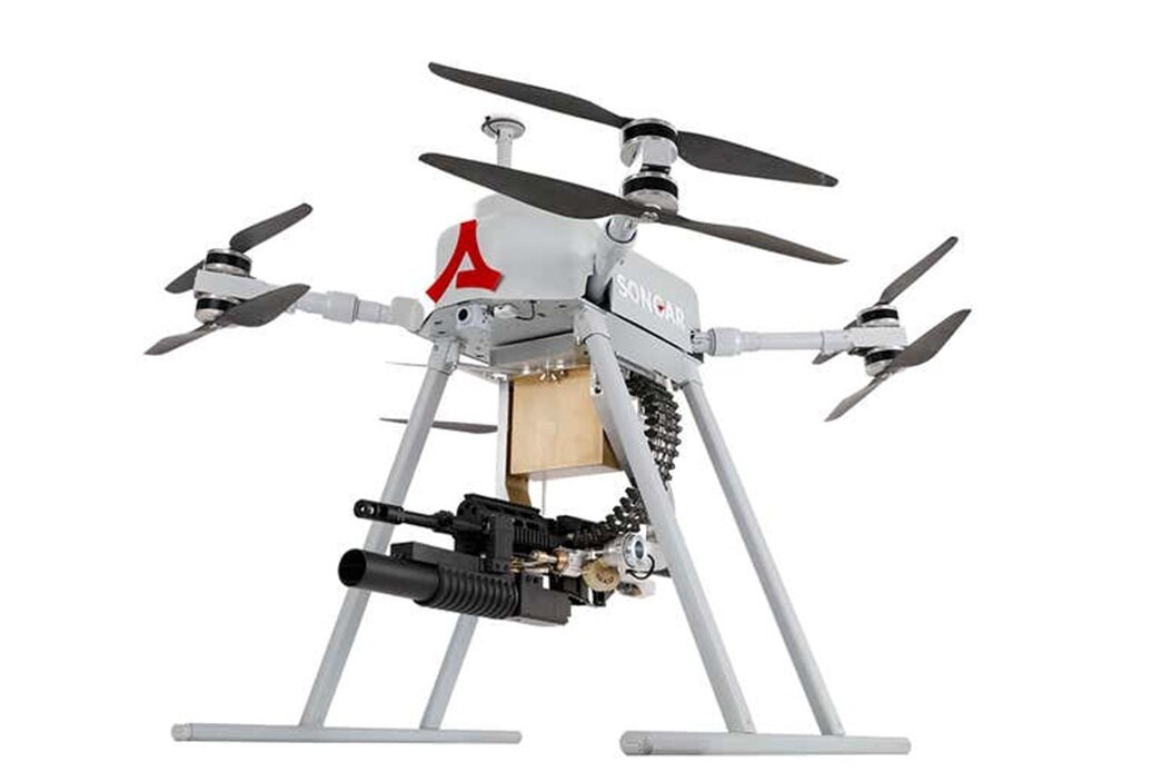 Коптер в пулемётом