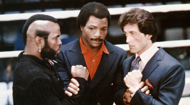 Слева направо: Клаббер Лэнг (Мистер Ти), Аполло Крид (Карл Уэзерс) и Рокки Бальбоа (Сильвестр Сталлоне) в фильме 1982 года «Рокки III».