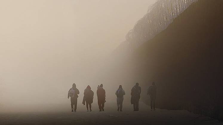    QIAN WEIZHONG/VCG Мигранты на границе США и Мексики