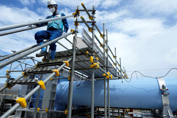 Eugene Hoshiko/Pool via Reuters