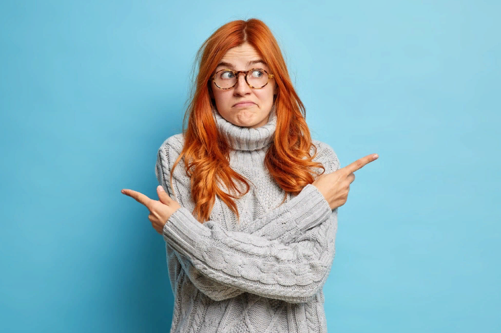 <a href="https://www.freepik.com/free-photo/doubtful-hesitant-redhead-woman-crosses-arms-body-points-different-sides-directions-chooses-two-options-wears-knitted-sweater_14270067.htm#page=2&query=%D0%B2%D1%8B%D0%B1%D0%BE%D1%80&position=31&from_view=search&track=ais&uuid=a2a506c0-0cca-4caf-aa06-988c2d06054e">Image by wayhomestudio</a> on Freepik