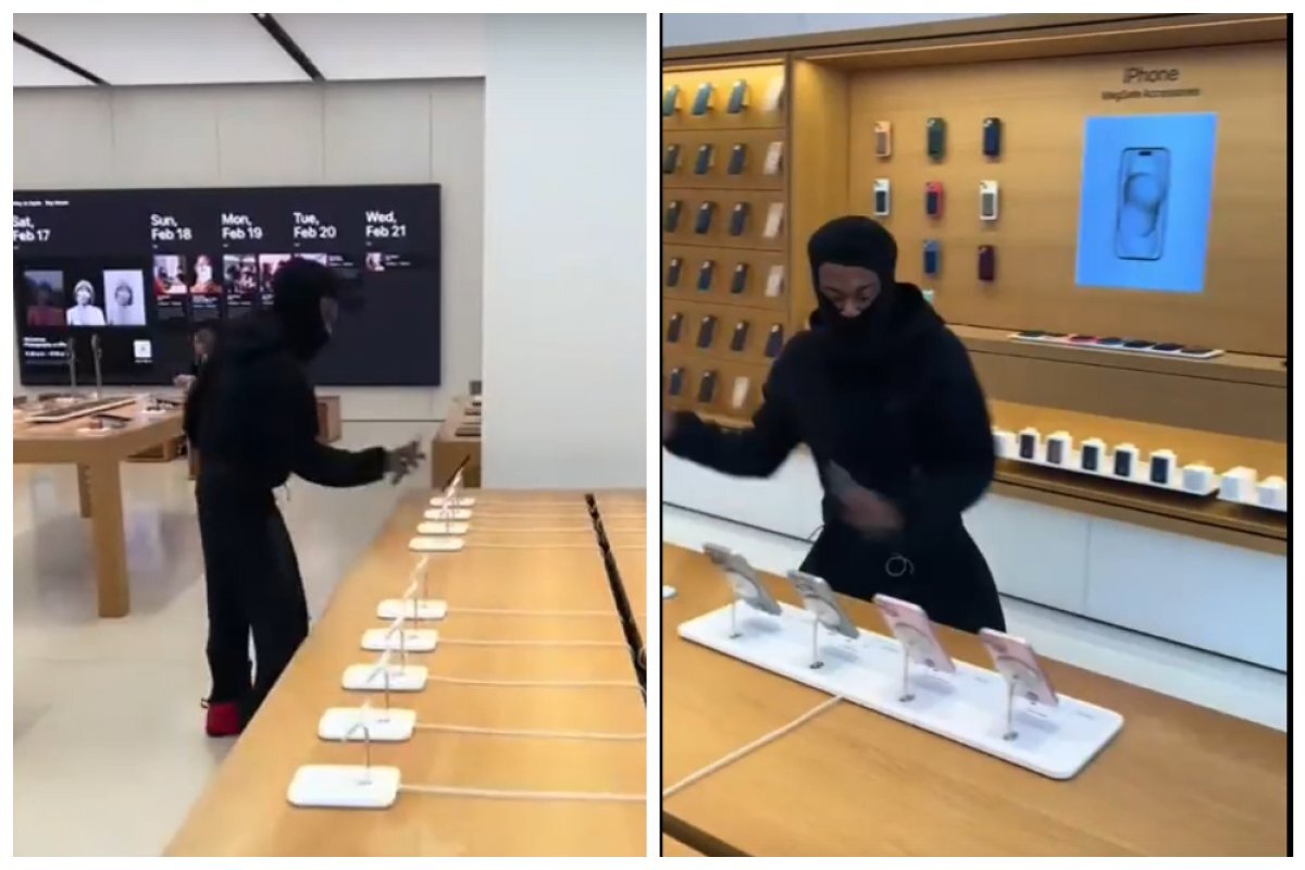    Чернокожий вор крадет телефоны из магазина.