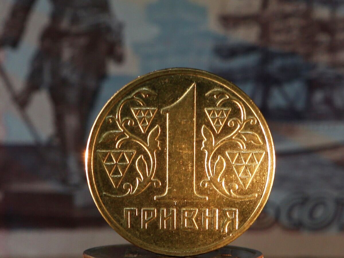    Денежные купюры и монеты России и Украины. Архивное фото© РИА Новости / Александр Демьянчук