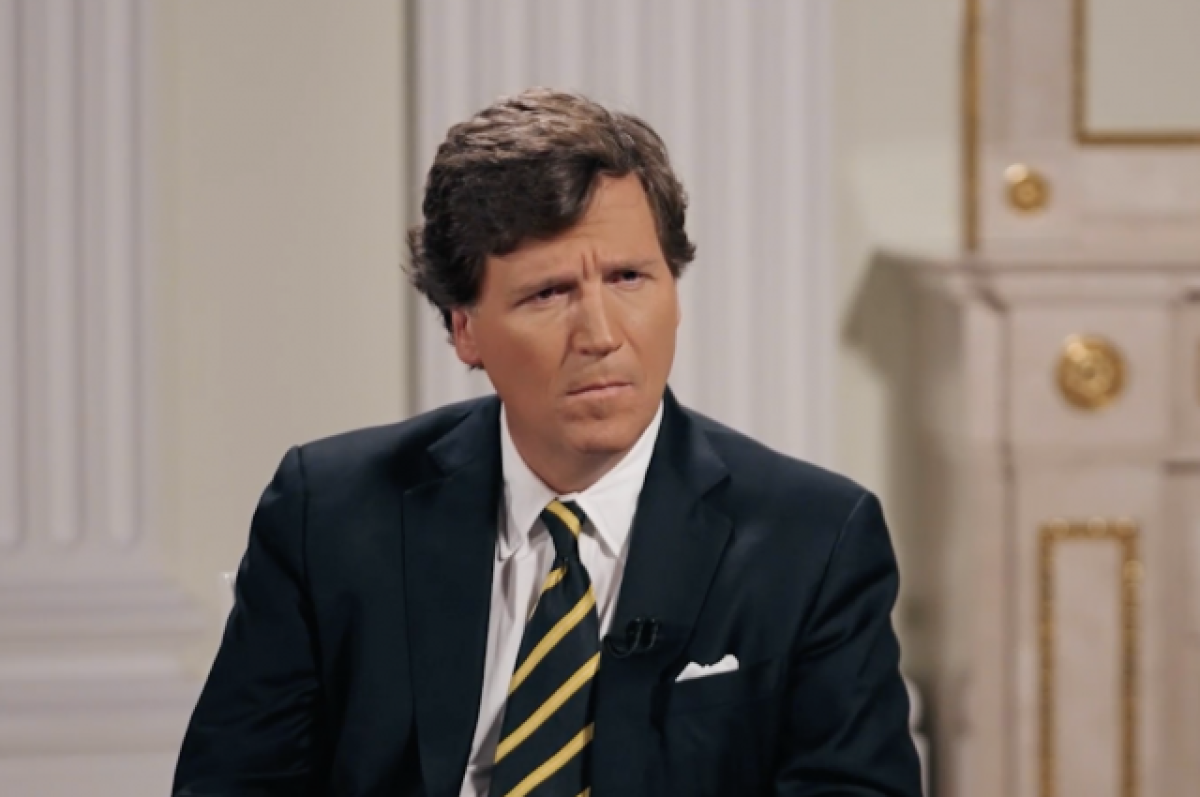    Такер Карлсон.