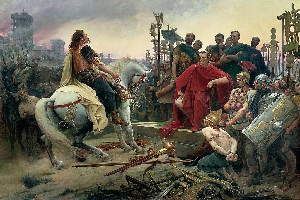 Сдача галльского вождя Верцинторикса Цезарю. Цезарь написал о Галльских войнах в своей книге «Комментарии Белло Галлико». Картина Лайонела Ройера.