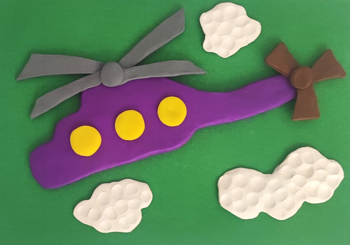 Готовый вариант аппликации из пластилина на цветном картоне Вертолёт.