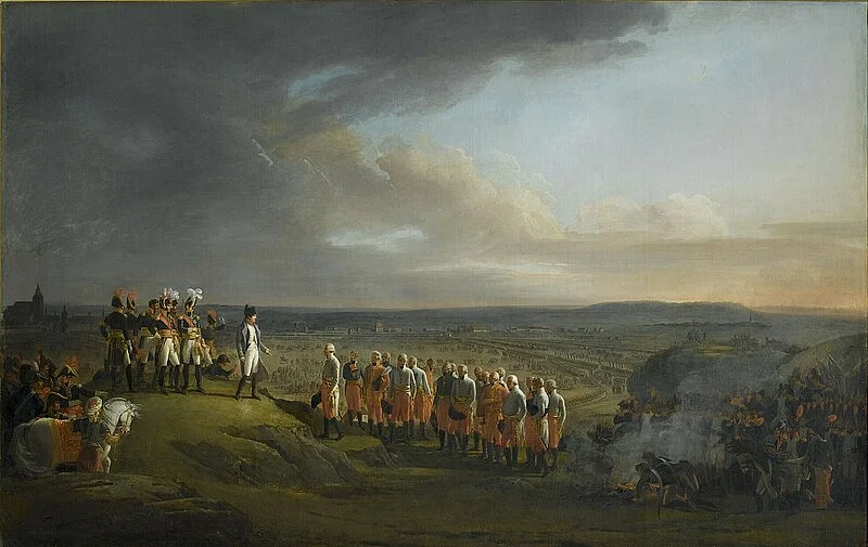 Французский император Наполеон I (годы правления 1804-1815) принимает капитуляцию австрийской армии под командованием генерала Мака 20 октября 1805 года, после Ульмской кампании. Холст, масло, картина Рене Теодора Бертона, ок. 1805-1810. 
Версальский Дворец.