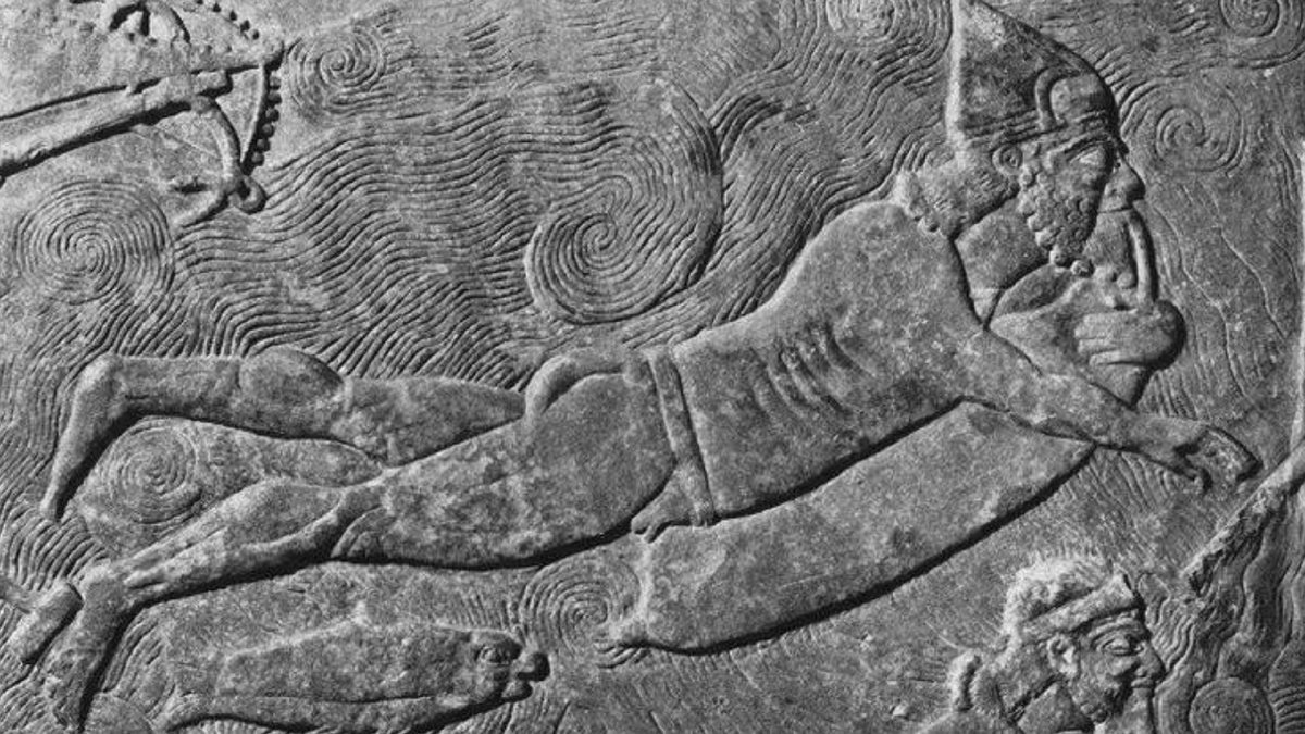 Ассирийские воины с "балонами для воздуха" плывут под водой. Барельеф 700 г. до н.э.