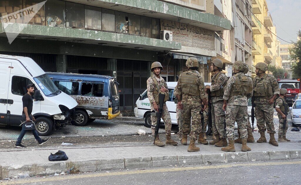 Военнослужащие Ливанской армии на одной из улиц Бейрута. В результате акции протеста, организованной шиитской группировкой "Хезболла" и ее союзниками у здания Дворца правосудия, в Бейруте вспыхнули вооруженные столкновения. © Sputnik / Михаил Алаеддин 