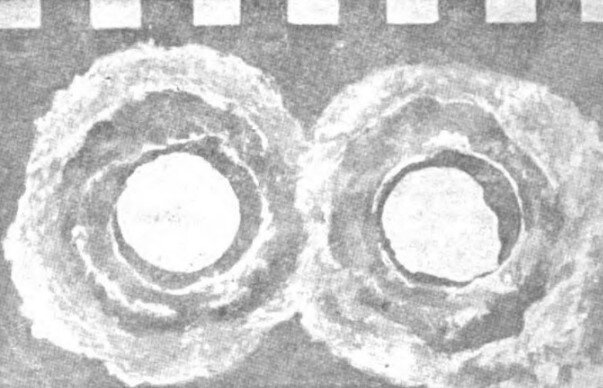 Выходные отверстия пуль в 12-мм броневой плите (фото из ВЗ №2-1931).