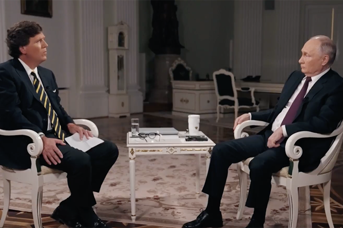    Такер Карлсон и Владимир Путин.