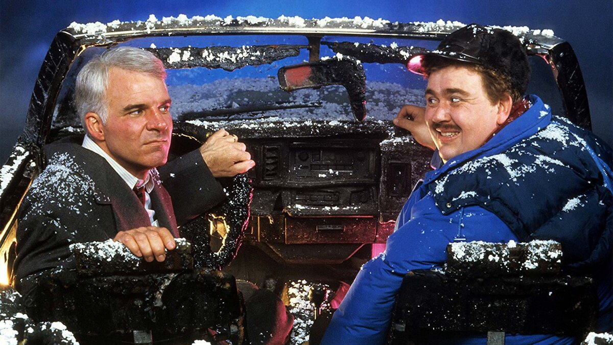 Кадр из фильма "Самолётом, поездом. машиной" (1987)