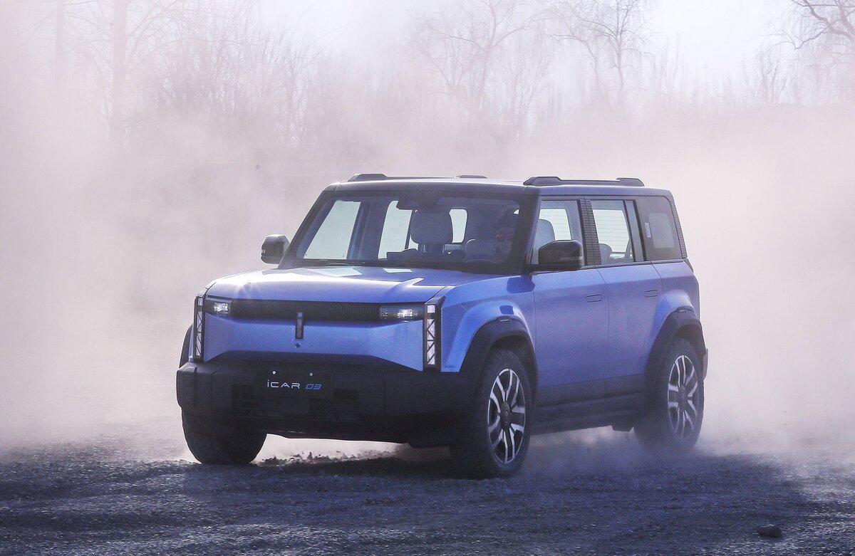 На фото: Электрический кроссовер Chery iCar 03
