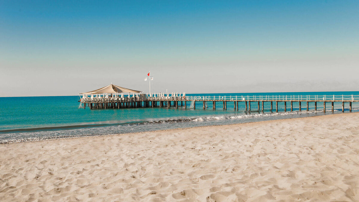 Песчаные пляжи турции белек. Кадрие белек турция. Gloria golf resort пляж. Белек какой пляж. Турция белек пляжи.