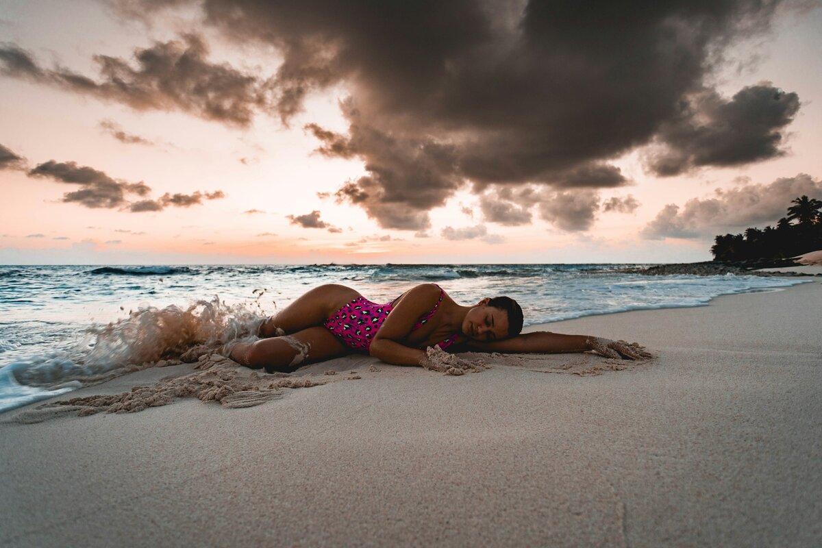 https://unsplash.com/photos/woman-in-purple-bikini-lying-on-beach-during-sunset-3P9j1WdqyY8?utm_content=creditShareLink&utm_medium=referral&utm_source=unsplash