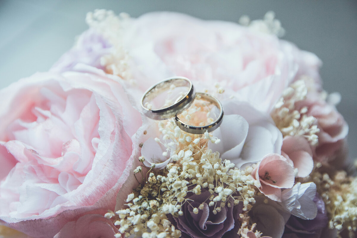 Photo by <a href="https://unsplash.com/@beatriz_perez?utm_content=creditCopyText&utm_medium=referral&utm_source=unsplash">Beatriz Pérez Moya</a> on <a href="https://unsplash.com/photos/gold-colored-bridal-ring-set-on-pink-rose-flower-bouquet-M2T1j-6Fn8w?utm_content=creditCopyText&utm_medium=referral&utm_source=unsplash">Unsplash</a>   