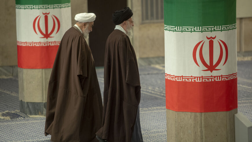 TEHRAN, IRAN - MARCH 01: Iran's supreme leader Ayatollah Ali Khamenei (R)leaves after casting his ballots during the parliamentary and key clerical body elections at a polling station on March 1, 2024 in Tehran, Iran. - Majid Saeedi/Getty Images