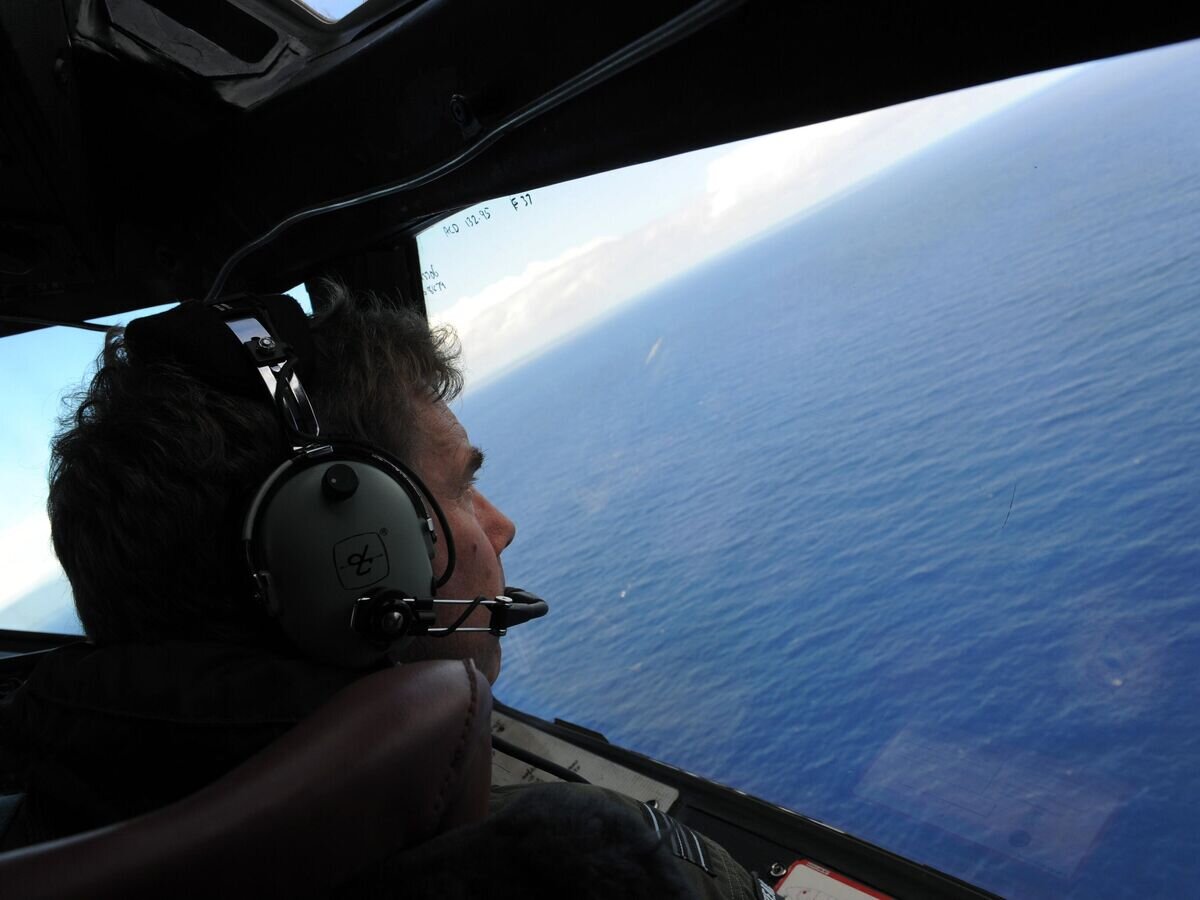     Поиски пропавшего самолета Boeing 777-200 авиакомпании Malaysia Airlines в Индийском океане© AP Photo / Greg Wood