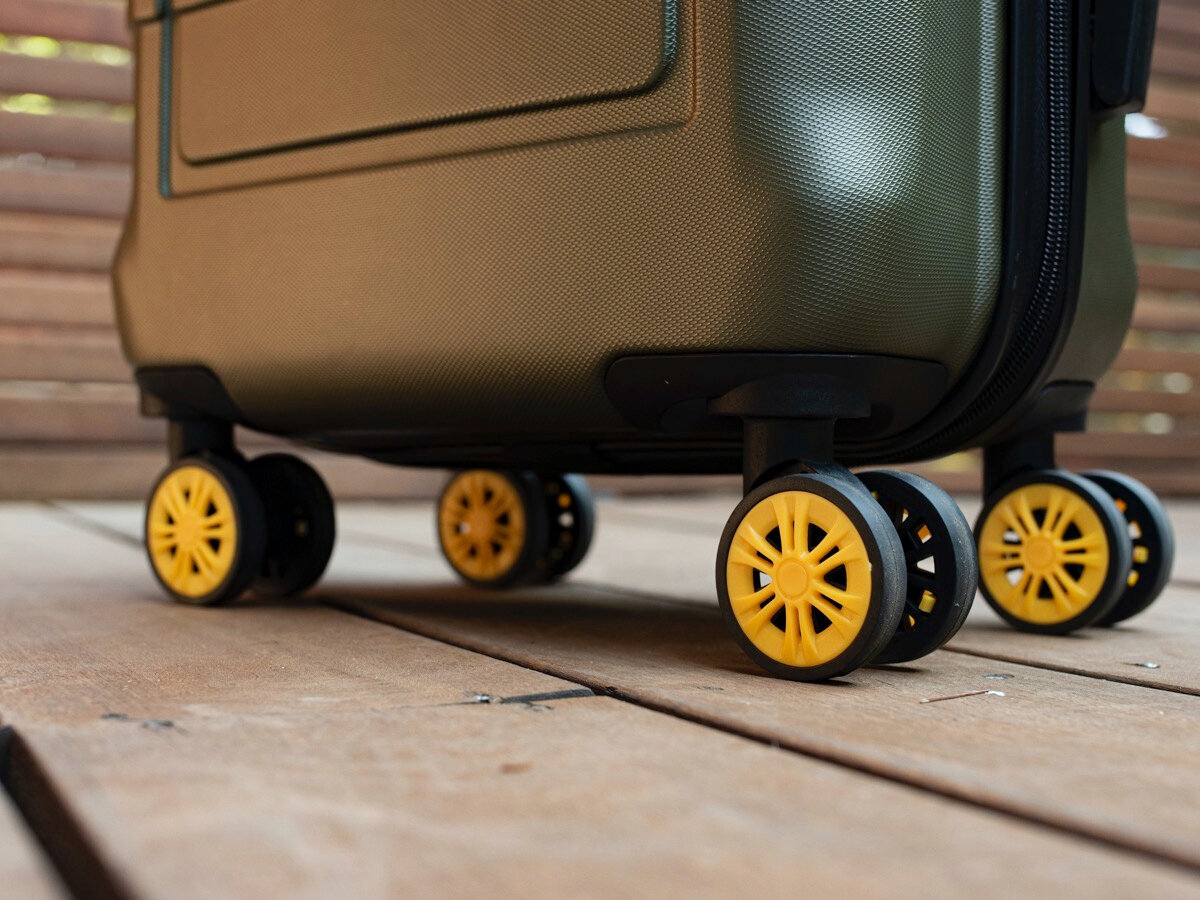 Double wheels will provide the suitcase with stability and a smoother ride. Source: Unsplash