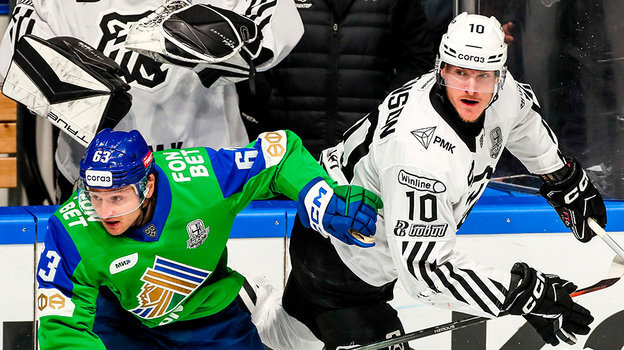    Чарльз Робинсон (справа).ХК «Трактор»