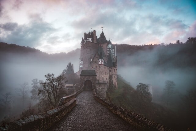Photo by <a href="https://unsplash.com/@cedericvandenberghe?utm_content=creditCopyText&utm_medium=referral&utm_source=unsplash">Cederic Vandenberghe</a> on <a href="https://unsplash.com/photos/closeup-photo-of-castle-with-mist-21DP3hytVHw?utm_content=creditCopyText&utm_medium=referral&utm_source=unsplash">Unsplash</a>
  