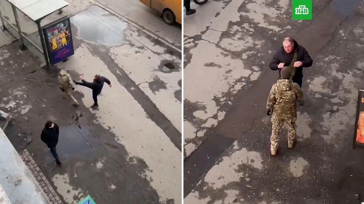 [ Смотреть видео на сайте НТВ ] На Украине мужчина увидел на улице сотрудника военкомата, дал ему пару подзатыльников и пнул. Очевидцы сняли происходившее на видео.