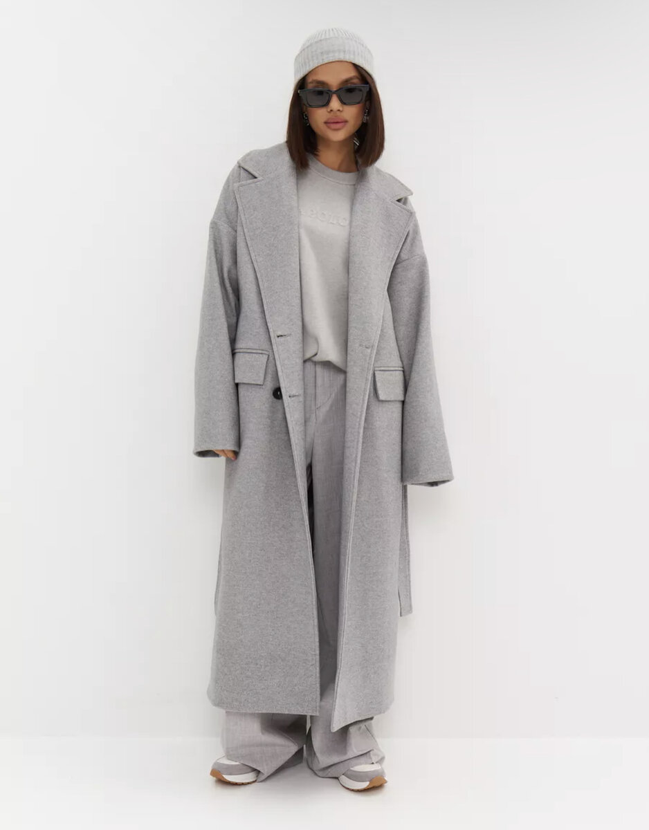 Данное пальто НЕ ТОЛСТОЕ, эта модель рассчитана на теплую весну и начало осени!!Пальто женское весеннее выполнено из премиальной ткани с добавлением вискозы и шерсти, которая не скатывается и не мнется в процессе носки. Пальто идет свободного кроя oversize, его можно носить без пояса в прямом виде с застегнутыми пуговицами, создавая повседневные casual образы, или с поясом на запах как пальто халат в более классической стилизации. Демисезонное пальто оверсайз выполнено из мягкой ткани, очень приятной на ощупь. Оно не тяжелое и очень комфортное в носке. 