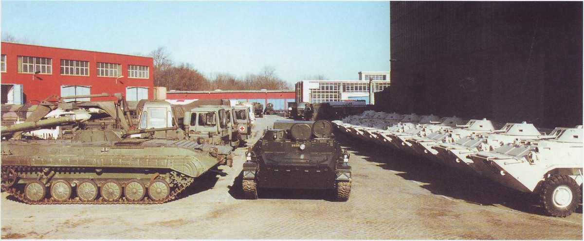 Техника бывшей ННА на заводе в Нойбранденбурге. По мимо БМП-1 (слева), в центре МТ-ЛБ, справа - БТР-70