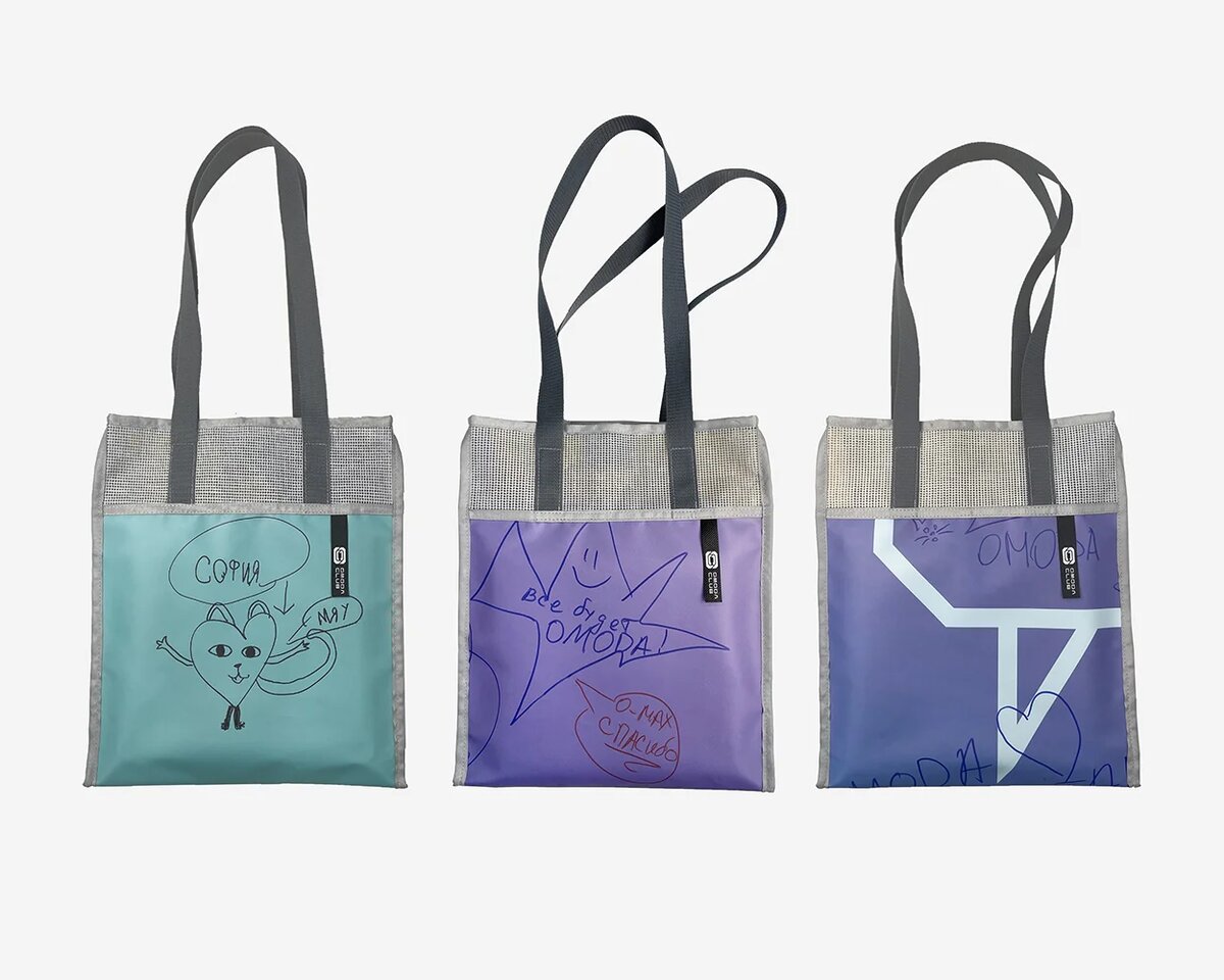 Шопперы из баннера, оставшегося после встречи владельцев автомобилей OMODA