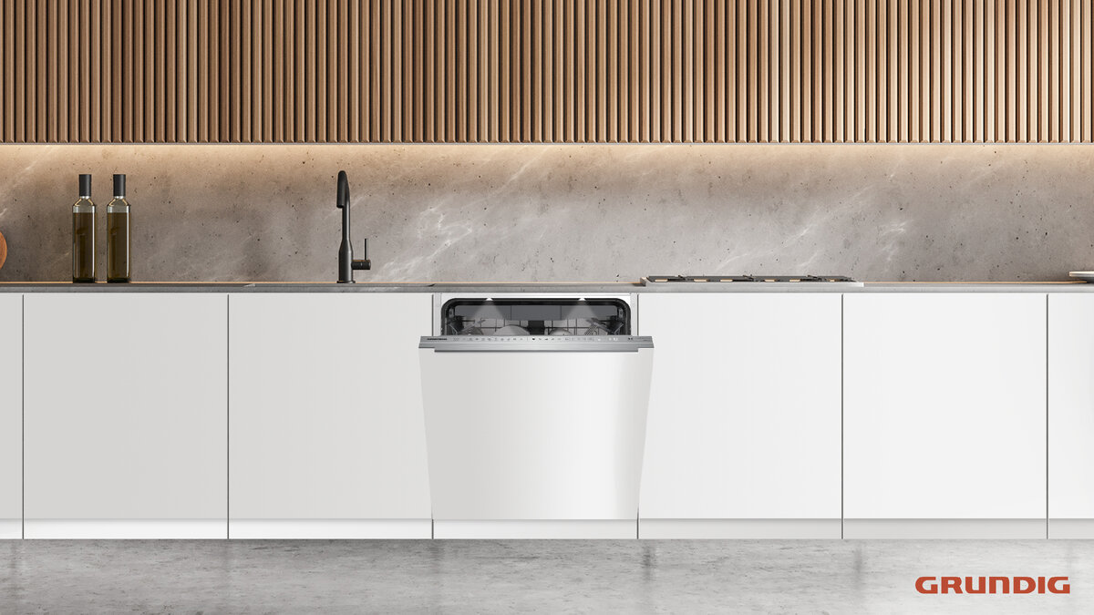 Посудомоечная машина Grundig GNVP4551PW вмещает до 15 комплектов посуды и совсем незаметна на кухне