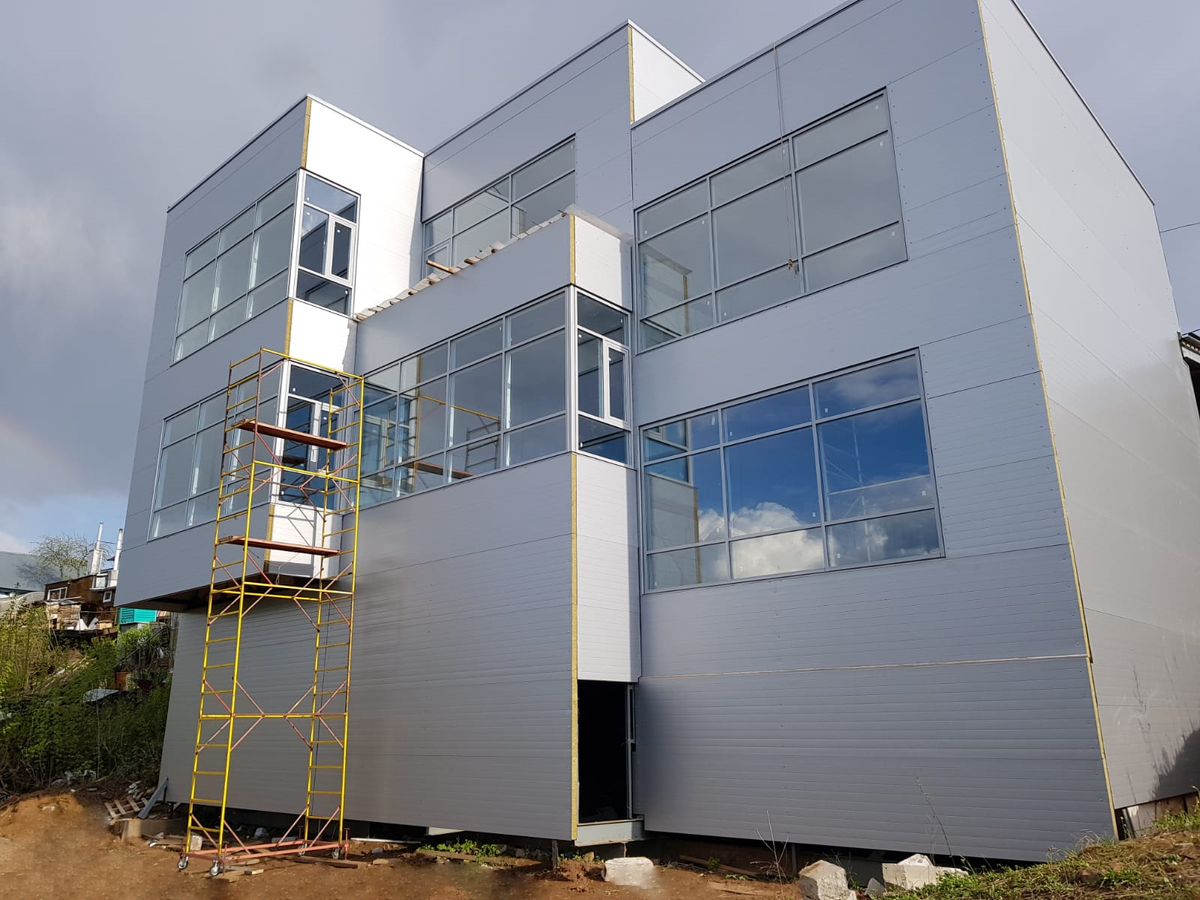 промышленная сэндвич панель. промышленные здания из сэндвич панелей. офис из сендвичных панелей. «жак торрес» архитектура фабрики. фасад ангара завод.