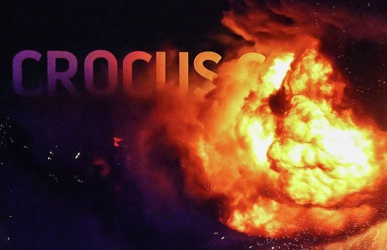 22.03.2024 Горящая крыша концертного зала “Крокус Сити Холл”, где произошла стрельба. Как минимум три человека в камуфляже открыли огонь в фойе здания, есть погибшие и раненые. Максим Блинов / РИА Новости