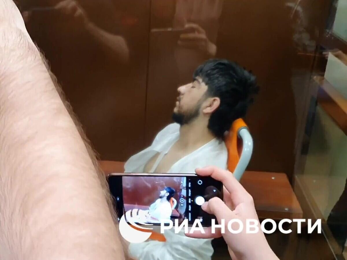    Четвертый фигурант дела о теракте в "Крокусе" Мухаммадсобир Файзов в зале суда© РИА Новости