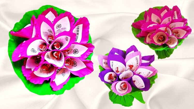 Вот так оригинально в качестве подарка можно свернуть лотерейные билеты. Отлично будет смотреться в дополнении с цветами