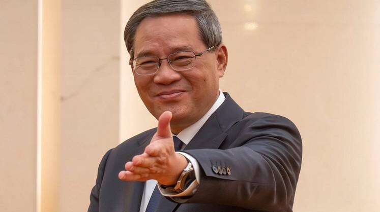    Mark Schiefelbein/ AP Премьер Госсовета КНР Ли Цян