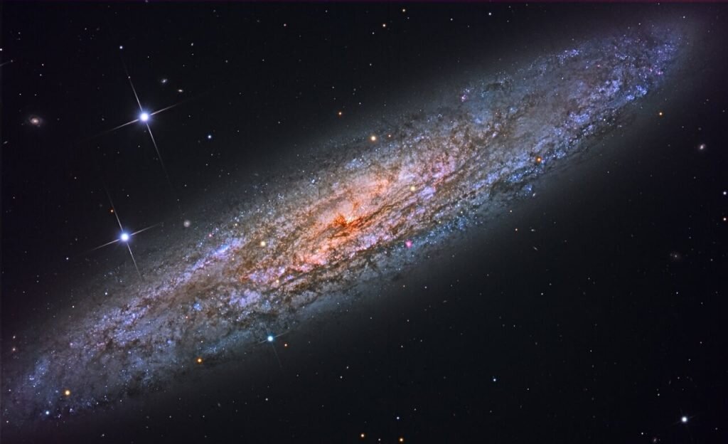    NGC 253 also goes by the name of “Sculptor Galaxy” after its parent constellation, or by the name “Silver Dollar Galaxy”, presumably after its visual appearance in the eyepiece. NGC 253 is classified as a starburst galaxy, but interestingly, only 1 supernova has been found within it. It is a bright galaxy, easily visible in binoculars, about 10 million light years from us. Александр Шереметьев