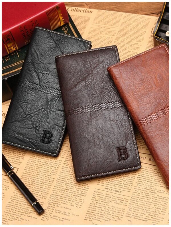 3. Современный мужчина выбирает качество и стиль. Представляем портмоне из искусственной кожи - сочетание всех необходимых функций: портмоне, клатч, кошелек и барсетка. Отделения для купюр, монет, банковских и дисконтных карт, а также отдел для документов на автомобиль. Надежность и комфорт в каждом движении!