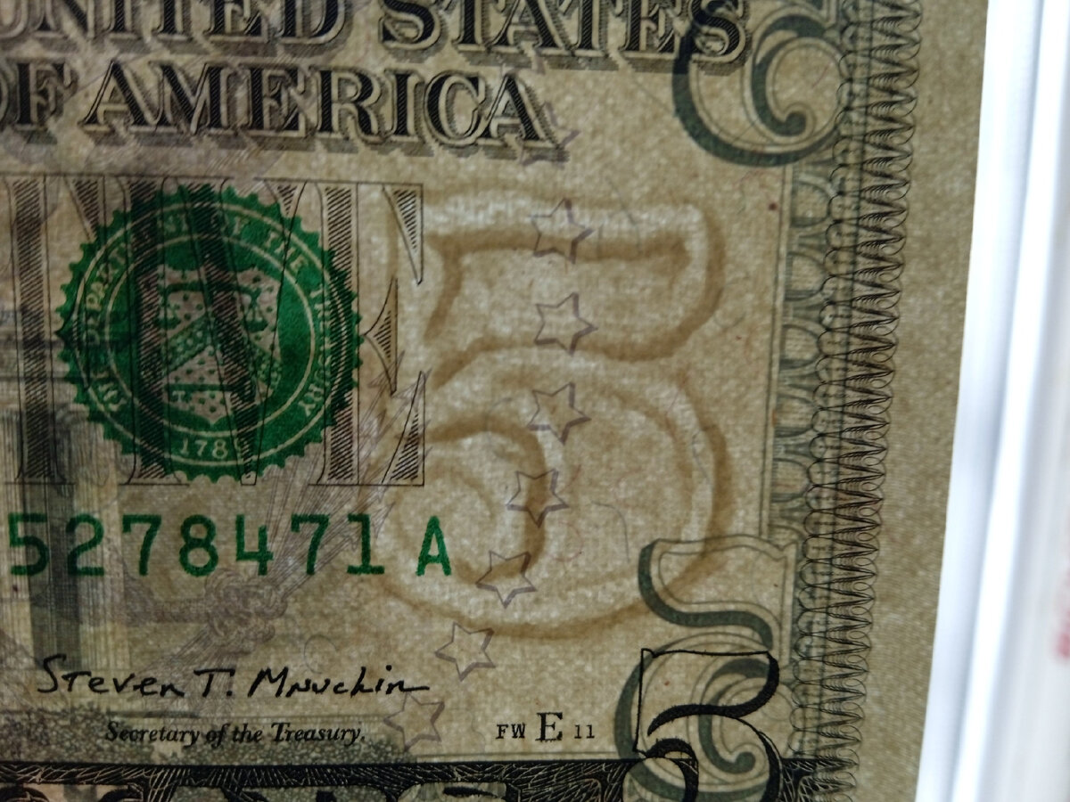 Водяной знак справа - одна крупная цифра "5"